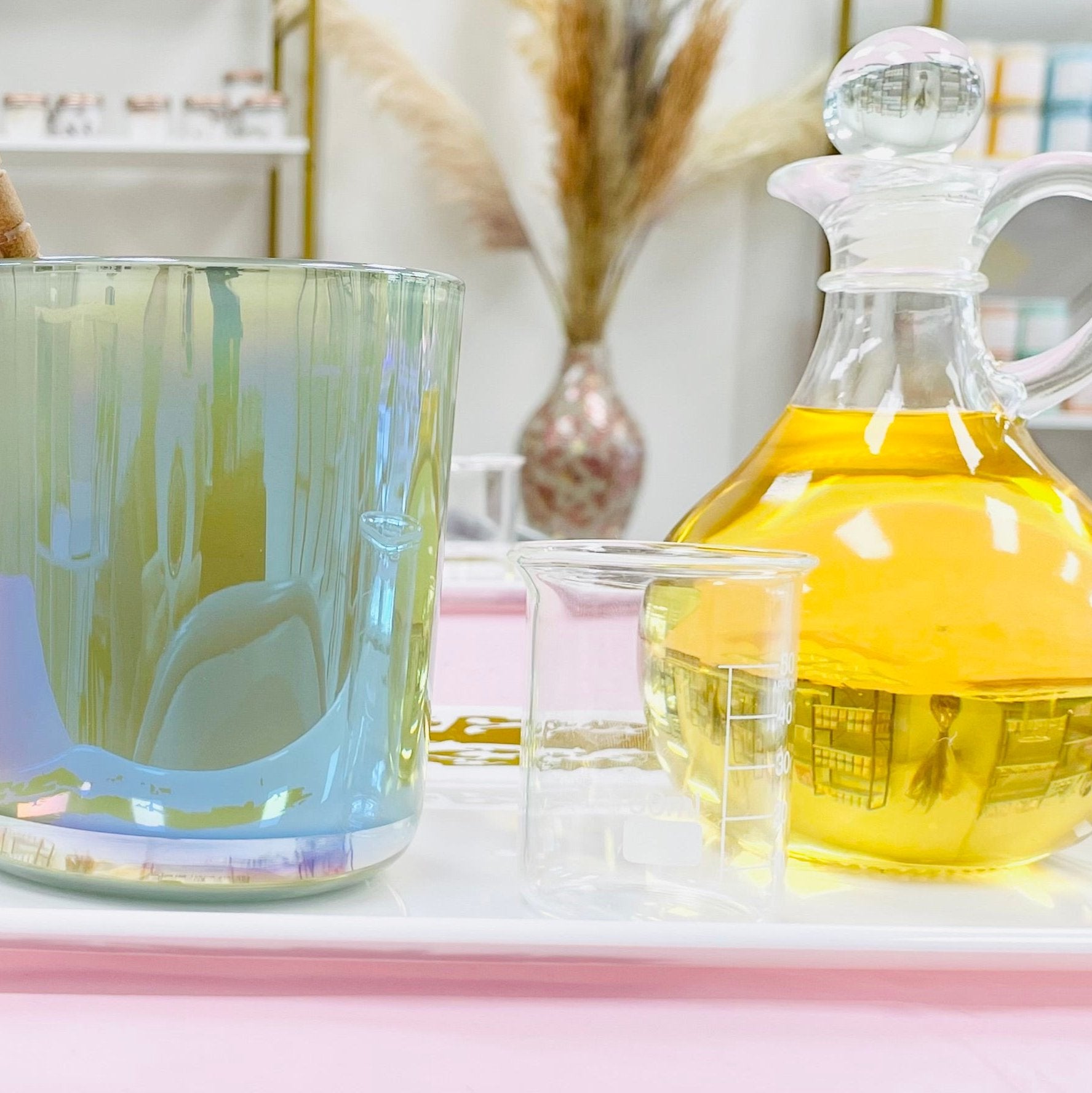 candle making class materials including the container the fragrance and the tray for the candle making class