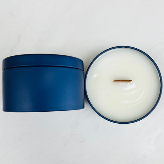 Lemon Zest luxury candle in a 8oz navy metal tin with a matching lid