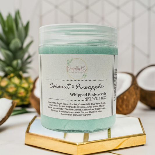 Coconut pineapple sugar scrub in a 11oz plastic container